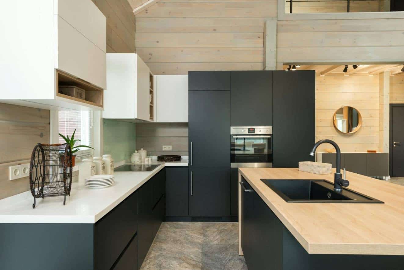 How to Design a Luxury Kitchen on a Budget - black kitchen design - Wood worktops